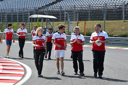 Charles Leclerc, Sauber walks the trackj with Ruth Buscombe, Sauber Race Strategist and Xevi Pujolar, Sauber Head of Track Engineering