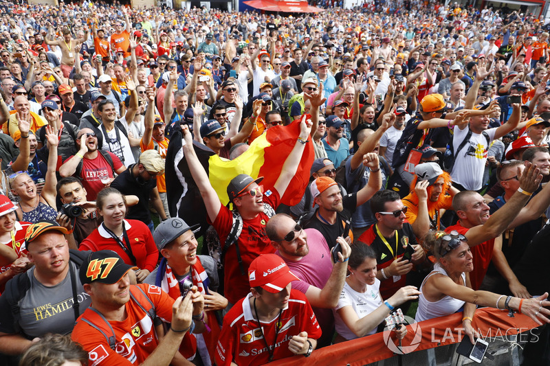Fans gather around the stage in the F1 Fanzone