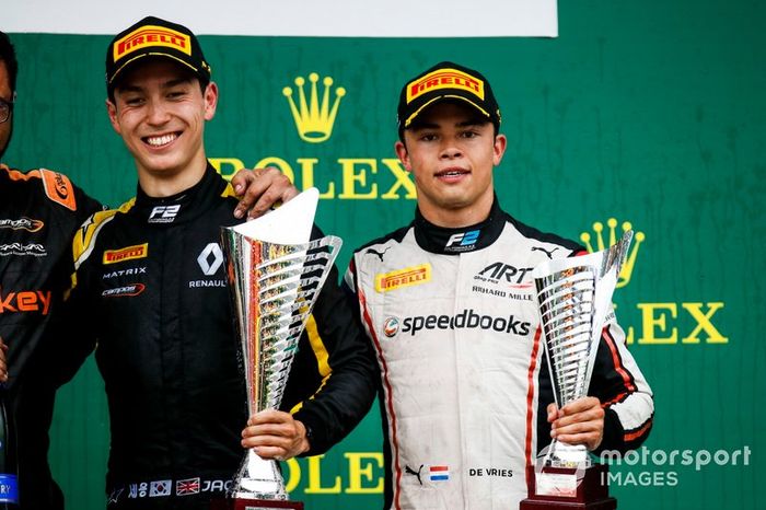 Race winner Jack Aitken, Campos Racing and Nyck De Vries, ART Grand Prix celebrate n the podium with the trophy