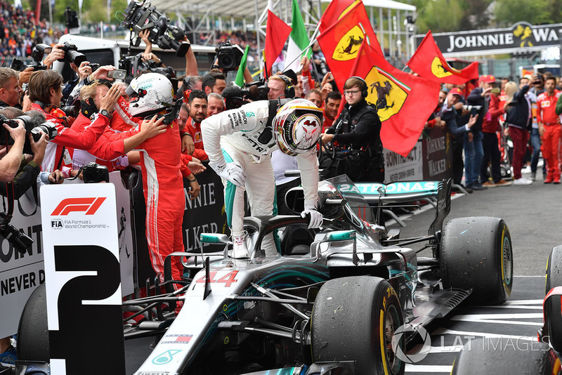 Sebastian Vettel, Ferrari and Lewis Hamilton, Mercedes AMG F1 W09 celebrate in parc ferme