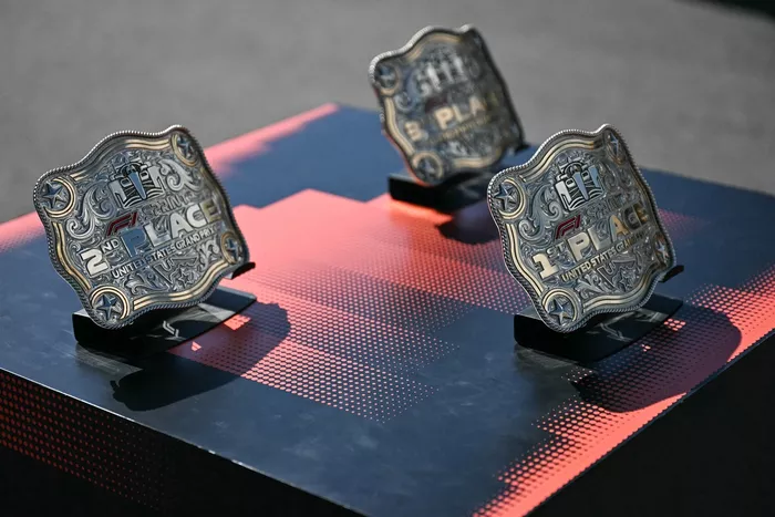 The awards for the 1st, 2nd and 3rd place finishers of the Sprint race
