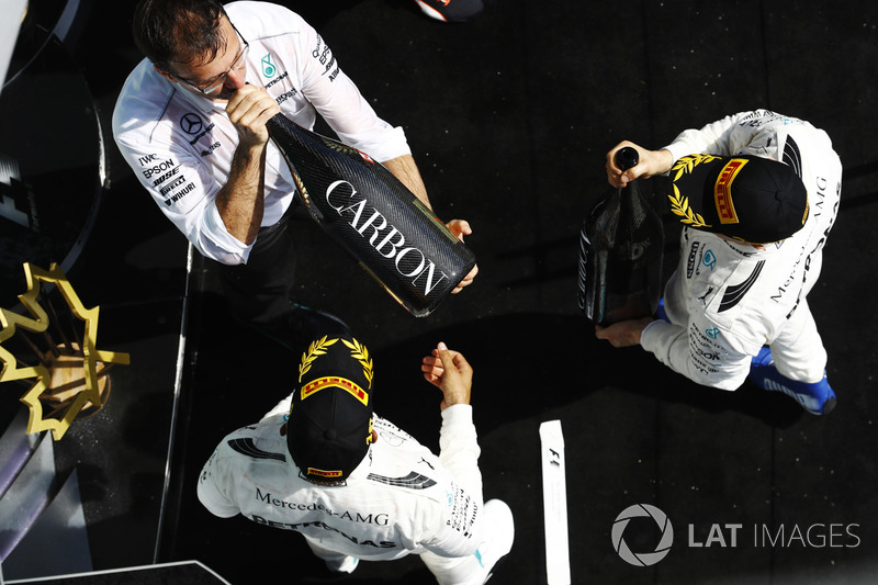 Lewis Hamilton, Mercedes AMG F1 and Valtteri Bottas, Mercedes AMG F1 on the podium