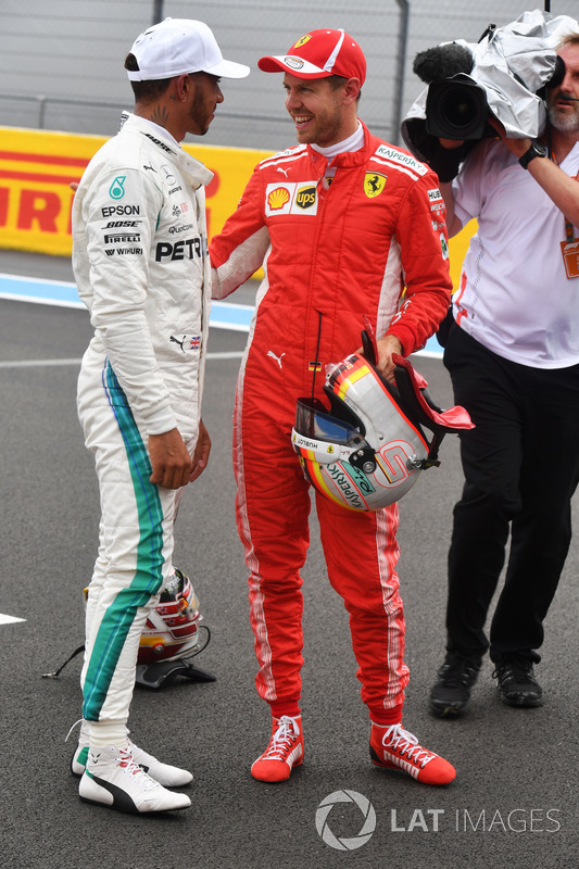 Lewis Hamilton, Mercedes-AMG F1 and Sebastian Vettel, Ferrari celebrate in parc ferme