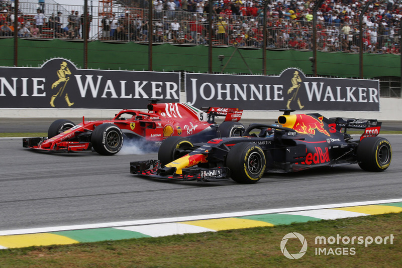 Daniel Ricciardo, Red Bull Racing RB14 y Sebastian Vettel, Ferrari SF71H