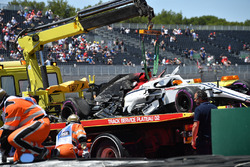 The crashed car of Marcus Ericsson, Sauber C37 is recovered in FP1