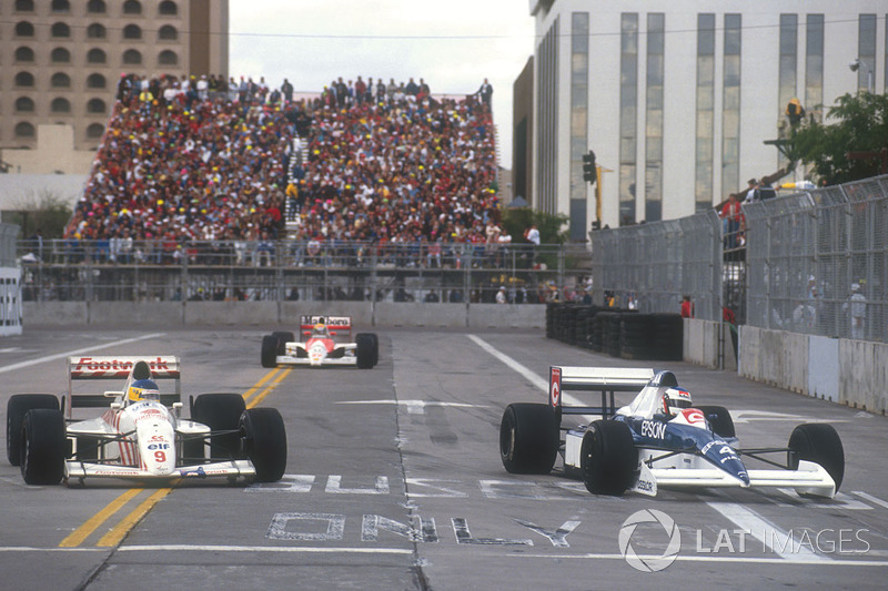 Жан Алезі (Tyrrell 018 Ford) випереджає на коло Мікеле Альборето (Arrows A11B Ford)
