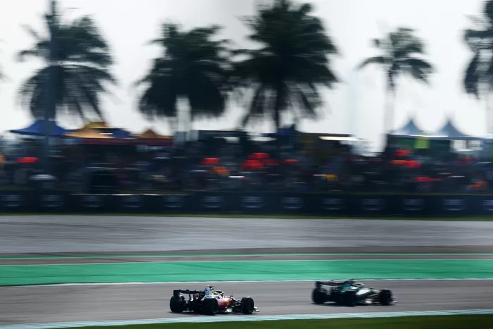 Lewis Hamilton, Ferrari, Lance Stroll, Aston Martin Racing