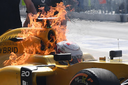 The burning car of Kevin Magnussen, Renault Sport F1 Team RS16