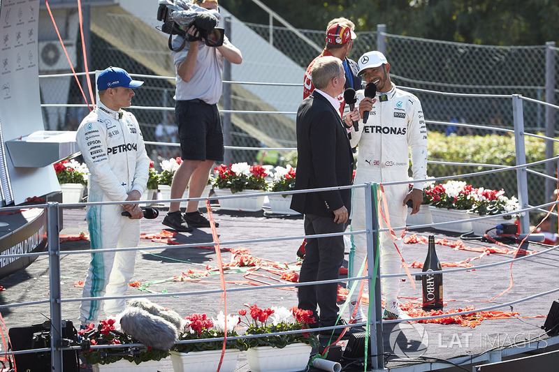 Martin Brundle, Sky Sports F1, interviews Race winner Lewis Hamilton, Mercedes AMG F1, on the podium