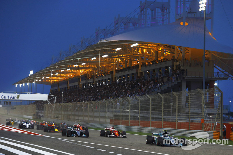 Valtteri Bottas, Mercedes AMG F1 W08, leads Sebastian Vettel, Ferrari SF70H, and Lewis Hamilton, Mercedes AMG F1 W08, at the start of the race