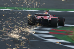 Sparks fly from the car of Kimi Raikkonen, Ferrari SF70H