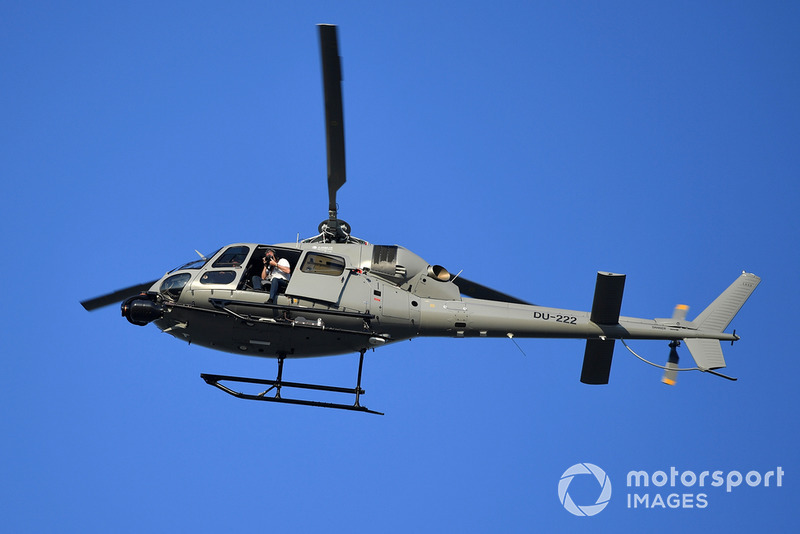 Helicóptero y fotógrafo