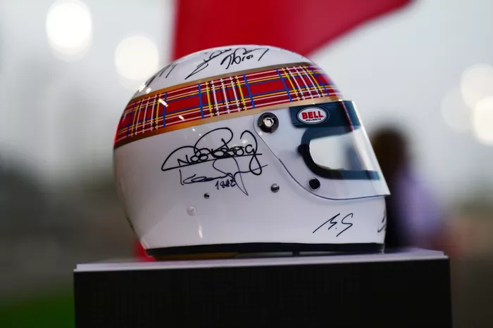 A helmet signed by all twenty living Formula 1 World Drivers Champions 