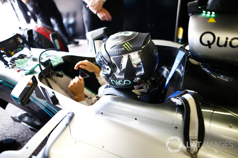 Former World Champions, Keke Rosberg and his son Nico Rosberg, prepare to lap the circuit in their title winning cars