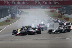 Romain Grosjean, Haas F1 Team VF-18, Carlos Sainz Jr., Renault Sport F1 Team R.S. 18 and Charles Leclerc, Sauber C37
