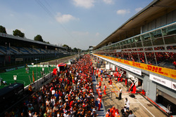Fans in the pit lane