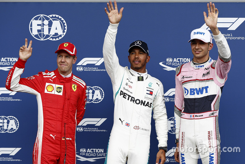 El poleman: Lewis Hamilton, Mercedes AMG F1, Sebastian Vettel, Ferrari, y Esteban Ocon, Racing Point Force India VJM11