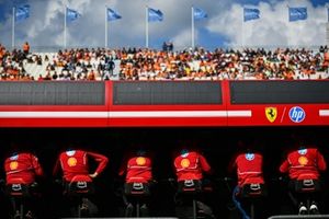 The Ferrari team on the pit wall