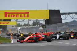 Sebastian Vettel, Ferrari SF71H leads at the start of the race