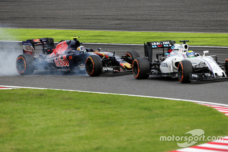 Felipe Massa, FW38 Williams y Carlos Sainz Jr, Scuderia Toro Rosso STR11 batalla por la posición