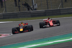 Sebastian Vettel, Ferrari SF70-H and Daniel Ricciardo, Red Bull Racing RB13