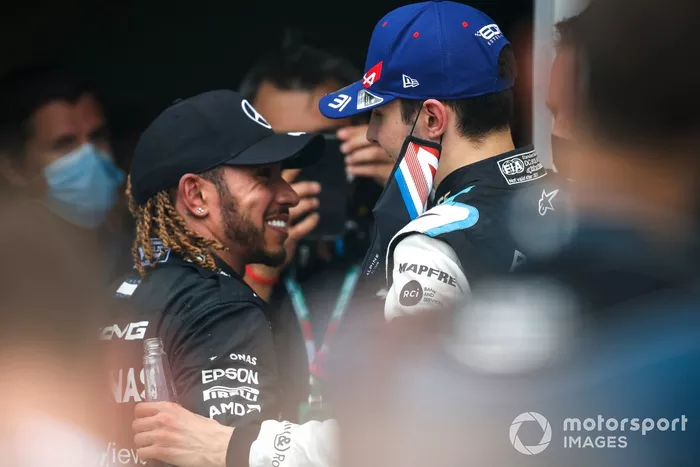 Lewis Hamilton, Mercedes, 3rd position, congratulates Esteban Ocon, Alpine F1, 1st position, in Parc Ferme