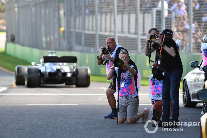 Photographers take aim in the pit lane