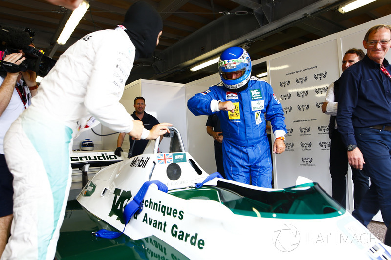 Former World Champions, Keke Rosberg and his son Nico Rosberg, prepare to lap the circuit in their title winning cars