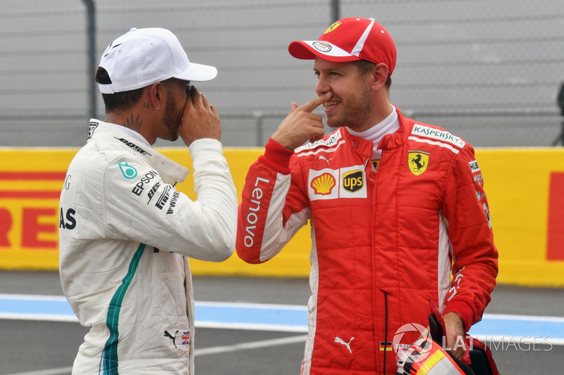 Lewis Hamilton, Mercedes-AMG F1 and Sebastian Vettel, Ferrari in parc ferme