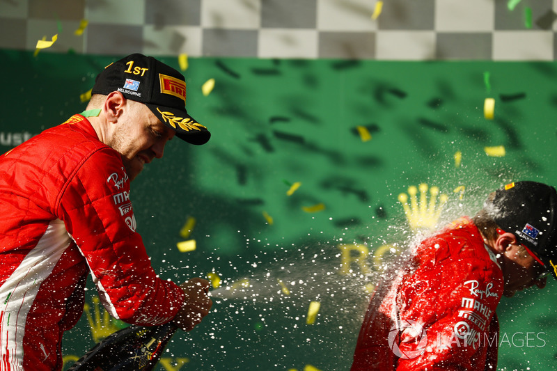 Sebastian Vettel, Ferrari, celebrates victory on the podium