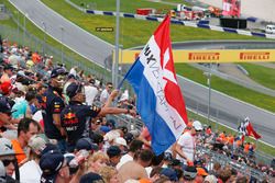 Max Verstappen, Red Bull Racing fans and flags in the grandstand