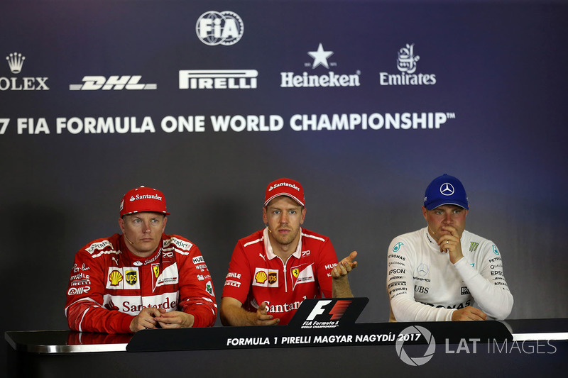 Press conference: race winner Sebastian Vettel, Ferrari, second place Kimi Raikkonen, Ferrari, third