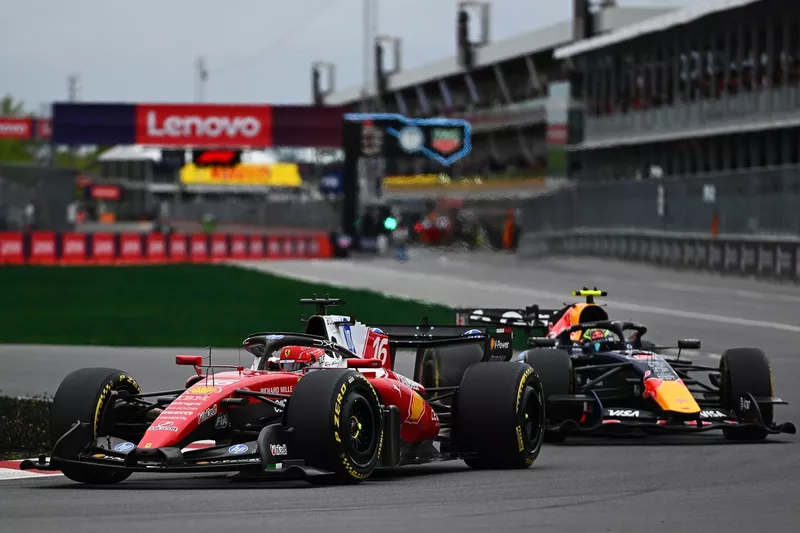 Charles Leclerc, Ferrari; Isack Hadjar, Red Bull Racing