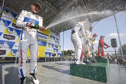 GTLM podium: race winners Antonio Garcia, Jan Magnussen, Corvette Racing, second place Ryan Briscoe, Richard Westbrook, Ford Performance Chip Ganassi Racing, third place Giancarlo Fisichella, Toni Vilander, Risi Competizione