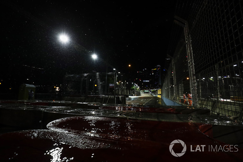 Rain falls before the start of the race