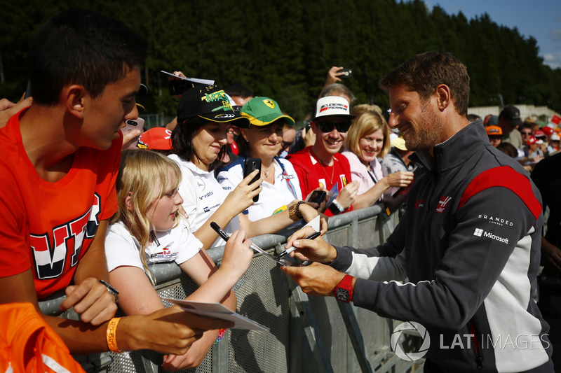 Romain Grosjean, Haas F1 Team, signs autographs for fans