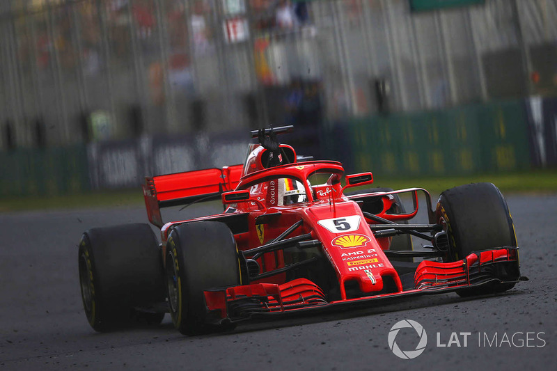 Sebastian Vettel, Ferrari SF71H, celebrates in his cockpit after winning the race