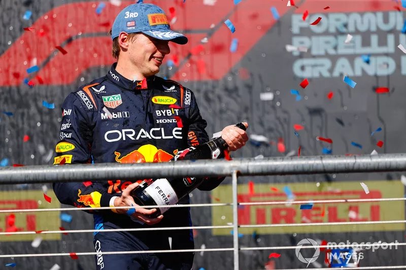 Max Verstappen, Red Bull Racing, 3rd position, sprays Champagne on the podium