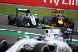 Nico Rosberg, Mercedes AMG Petronas F1 W07 and Max Verstappen, Red Bull Racing RB12