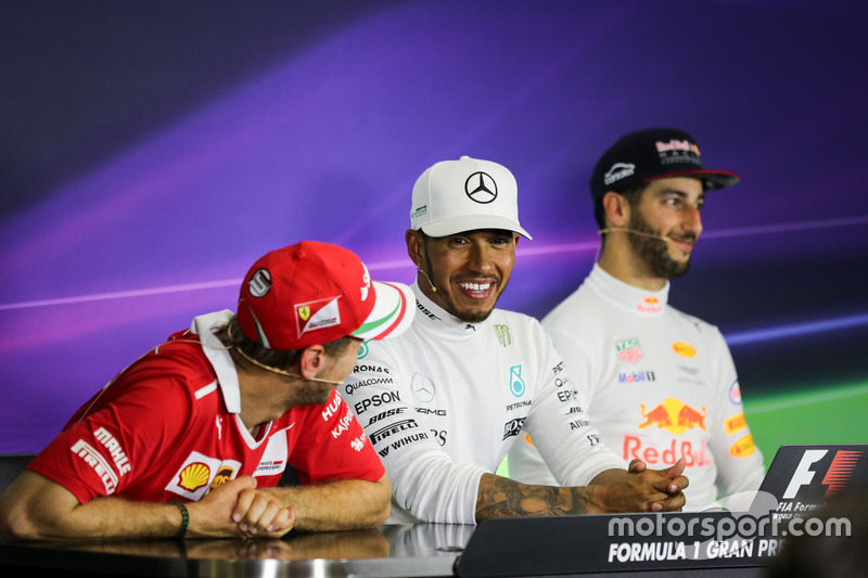 Sebastian Vettel, Ferrari, Lewis Hamilton, Mercedes AMG F1 and Daniel Ricciardo, Red Bull Racing