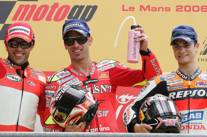 Podio: 1º Marco Melandri, 2º Loris Capirossi, 3º Dani Pedrosa