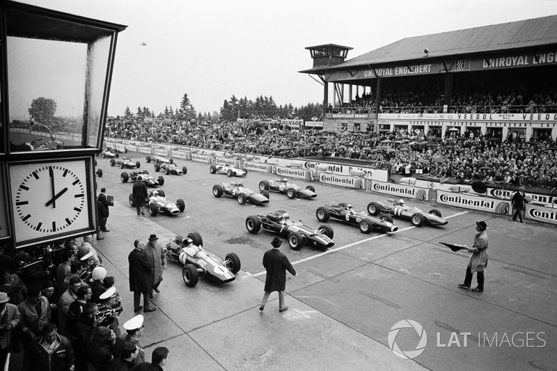 Ricardo Rodriguez leads his Ferrari team-mate Phil Hill into Eau Rouge