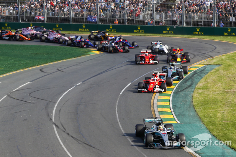 Lewis Hamilton, Mercedes AMG F1 W08, leads the field through the first corner