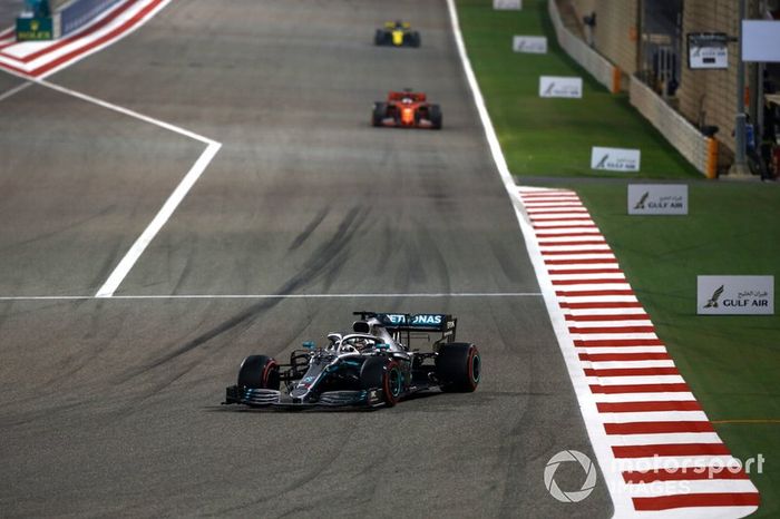 Lewis Hamilton, Mercedes AMG F1 W10, leads Sebastian Vettel, Ferrari SF90