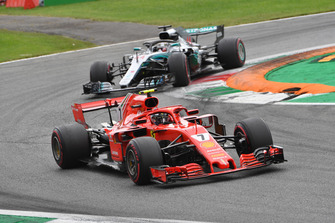 Kimi Raikkonen, Ferrari SF71H and Lewis Hamilton, Mercedes AMG F1 W09 battle