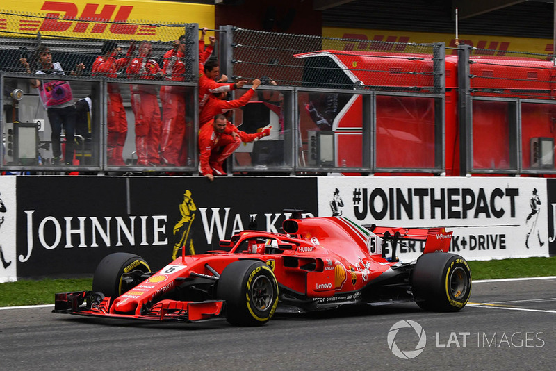 Race winner Sebastian Vettel, Ferrari SF71H crosses the line