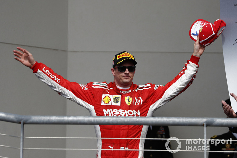 Kimi Raikkonen, Ferrari, 1st position, arrives on the podium