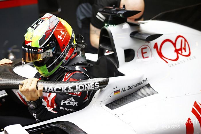 Mick Schumacher, Haas VF-20, enters his cockpit