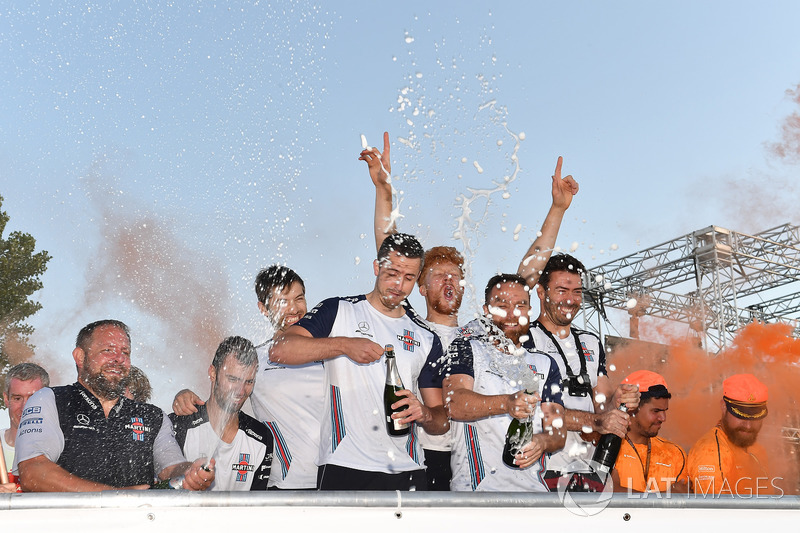 Williams celebrate on the podium at the raft race