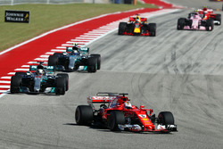 Sebastian Vettel, Ferrari leads Lewis Hamilton, Mercedes AMG F1 W08